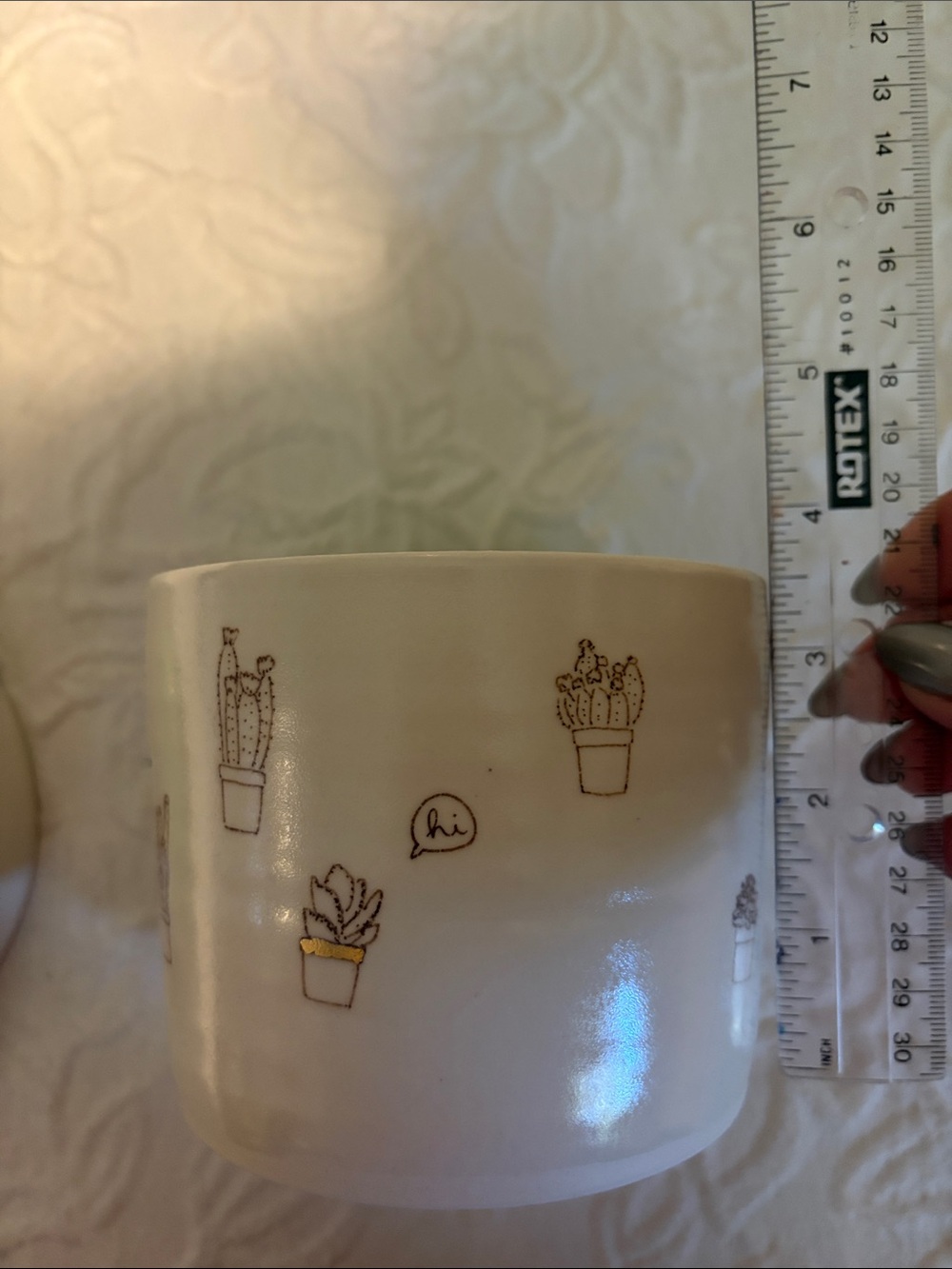 Whimsical White Ceramic Planter with Green Interior and Cactus Motif - Picture 7 of 11